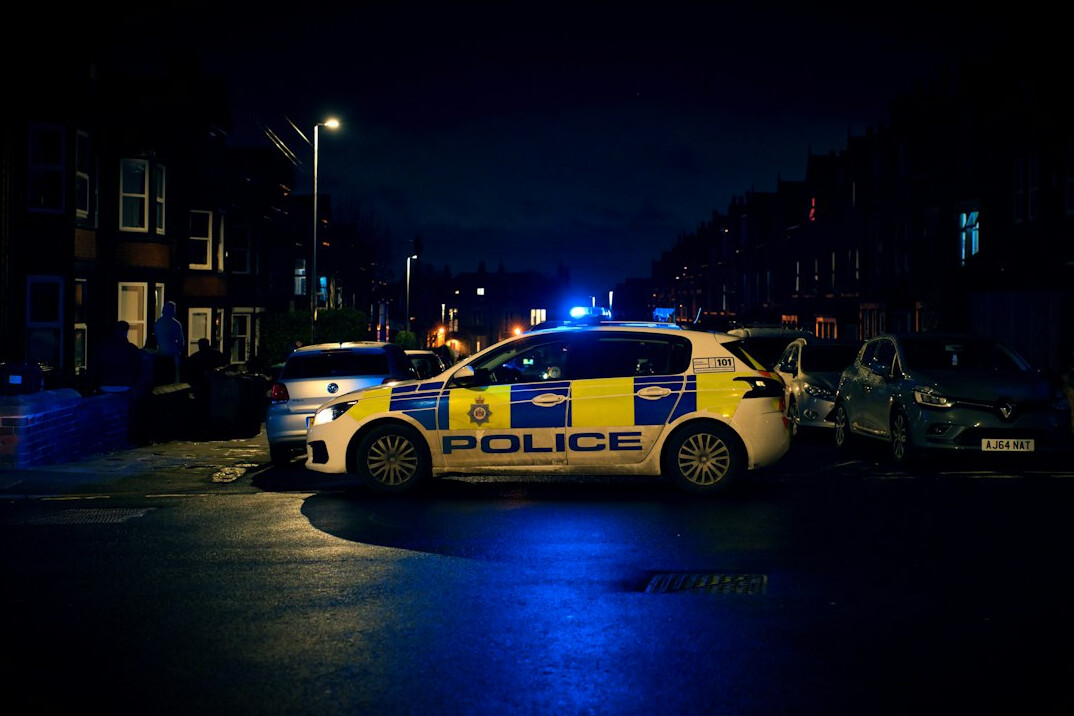 detective investigating crime scene